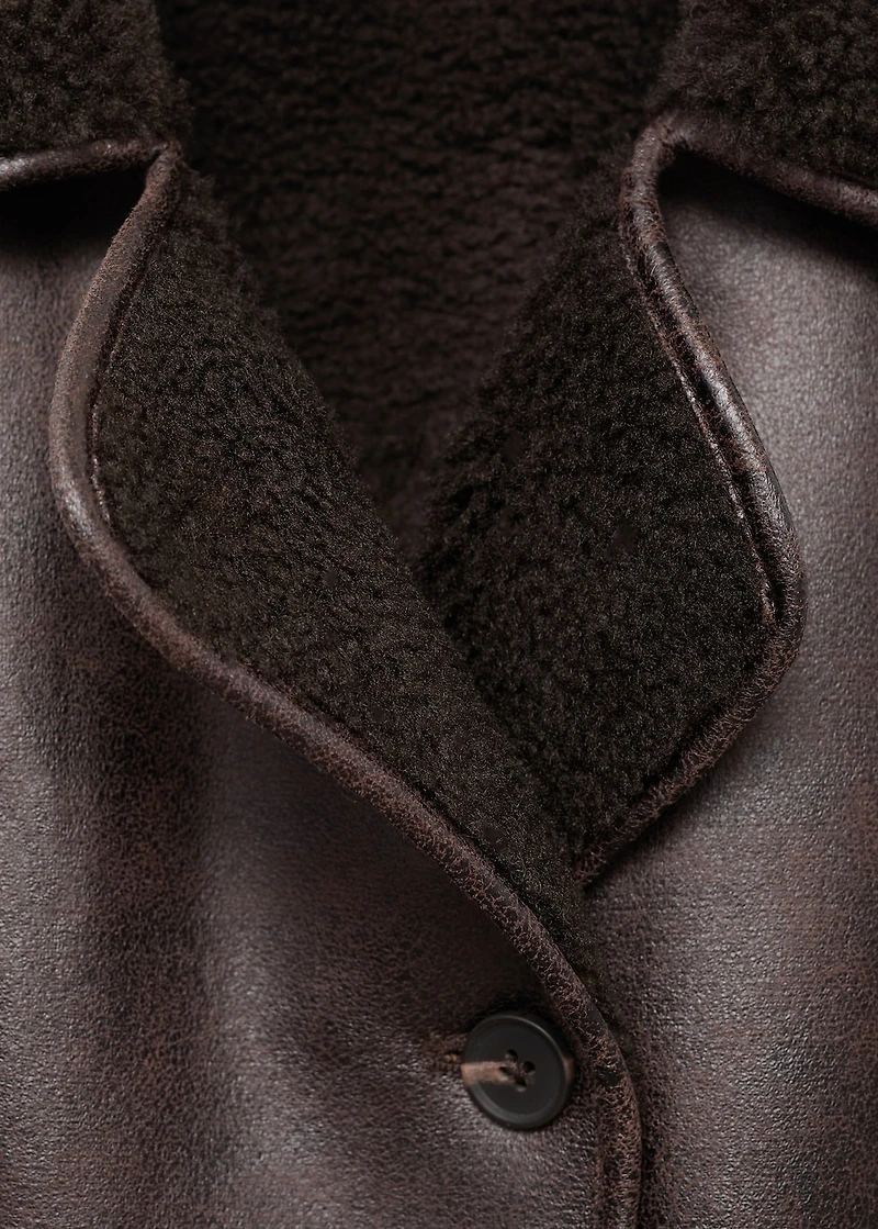 Coat with fur-effect lining