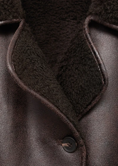 Coat with fur-effect lining