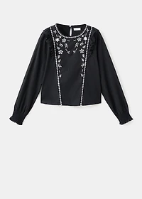 Ruffled embroidered blouse