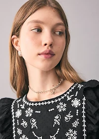 Ruffled embroidered blouse