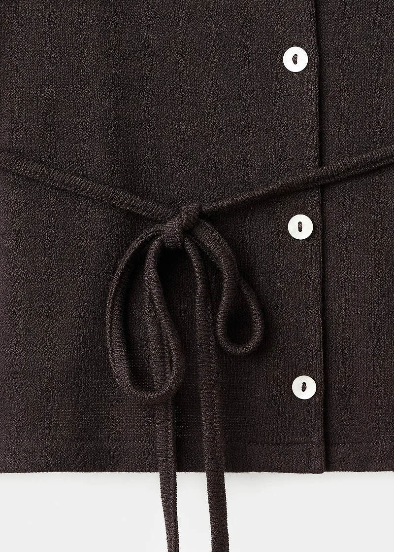 Knitted cardigan with bow