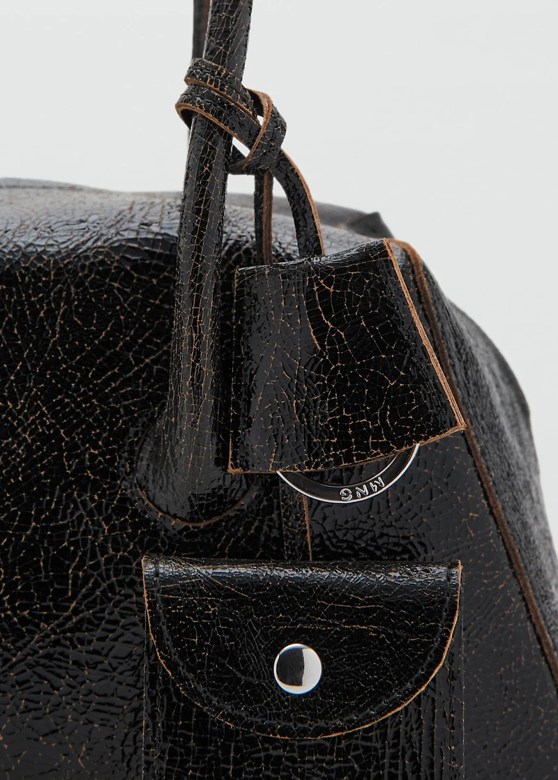 Leather shoulder bag with charms