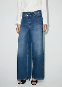 Wide-leg mid-rise jeans with a crossover waistband