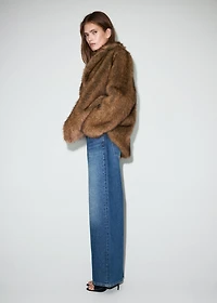 Wide-leg mid-rise jeans with a crossover waistband