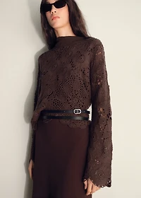 Crochet sweater with flowers