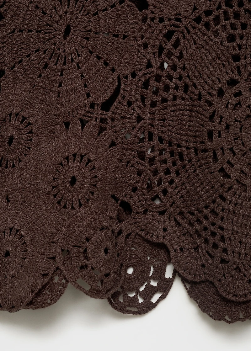 Crochet sweater with flowers