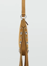 Suede bag with fringes and stud details
