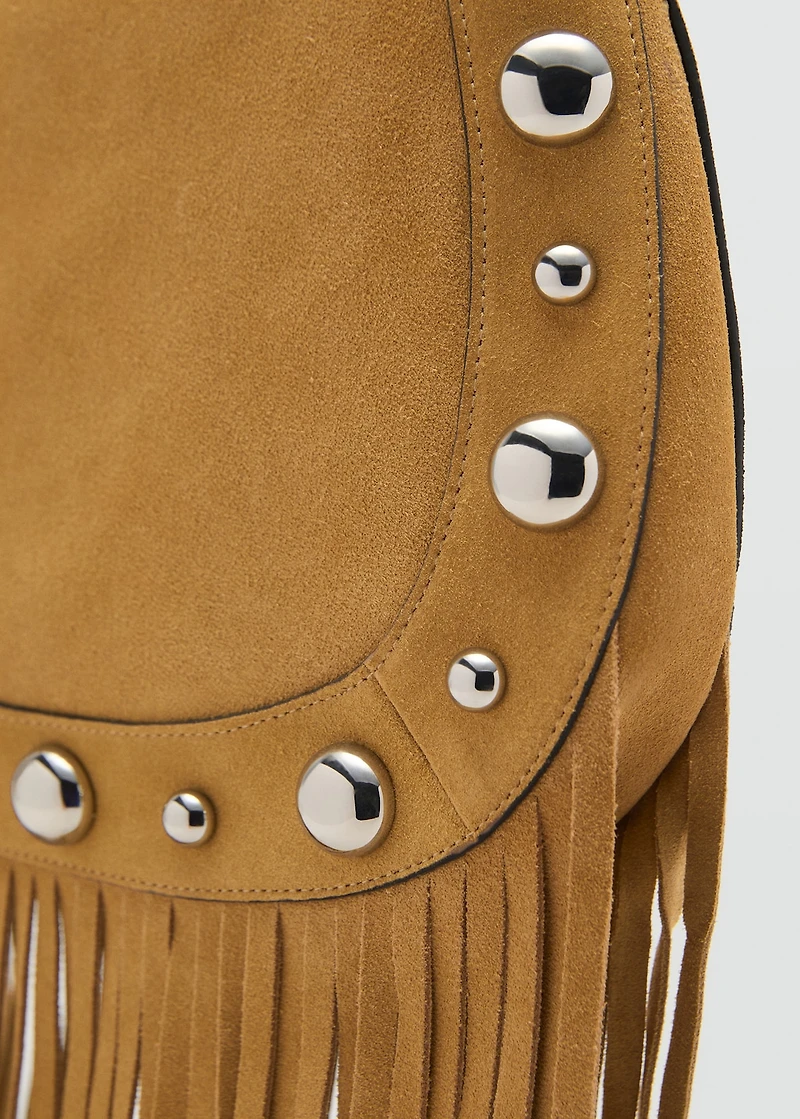 Suede bag with fringes and stud details