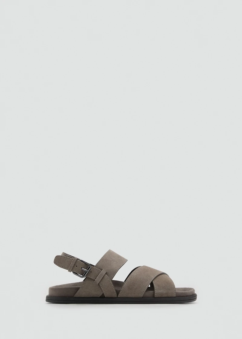 Crossed leather sandals with buckle