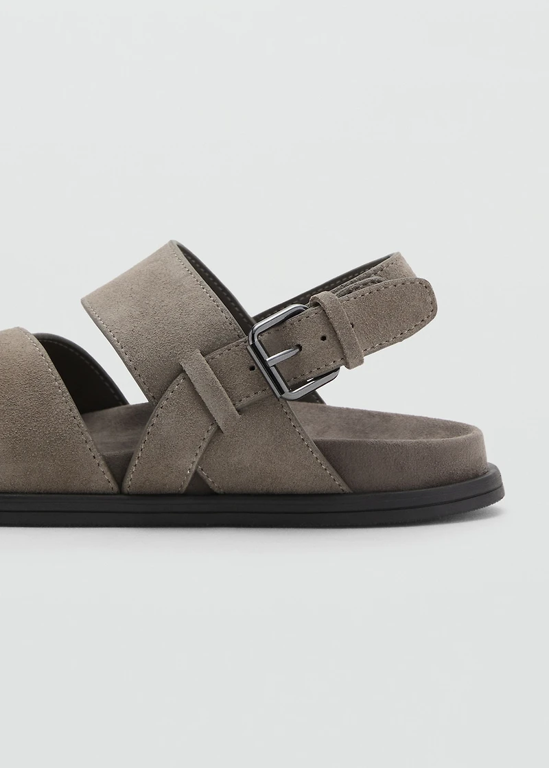 Crossed leather sandals with buckle