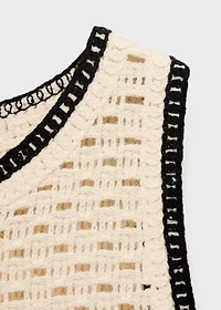 Crochet top with floral finishes