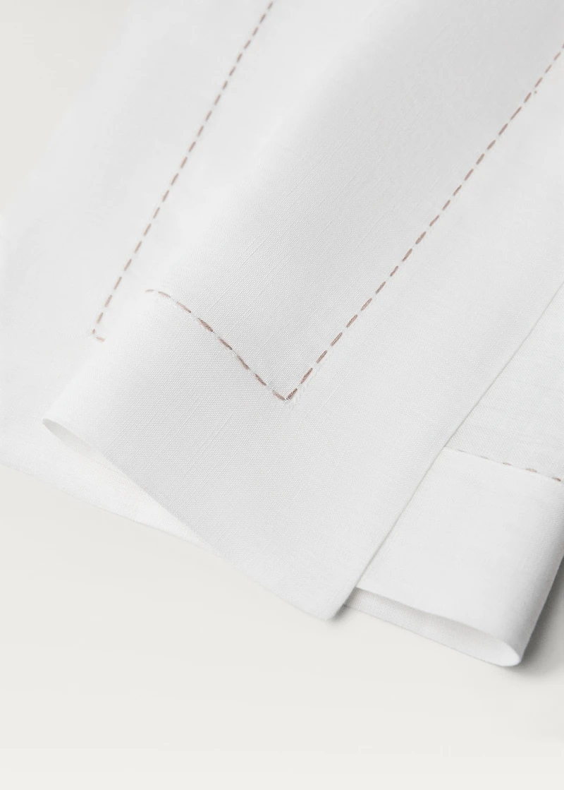 Linen tablecloth with embroidered backstitch