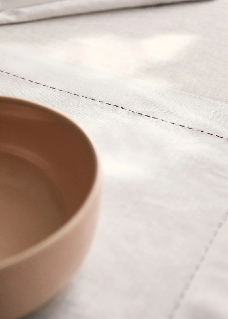 Linen tablecloth with embroidered backstitch
