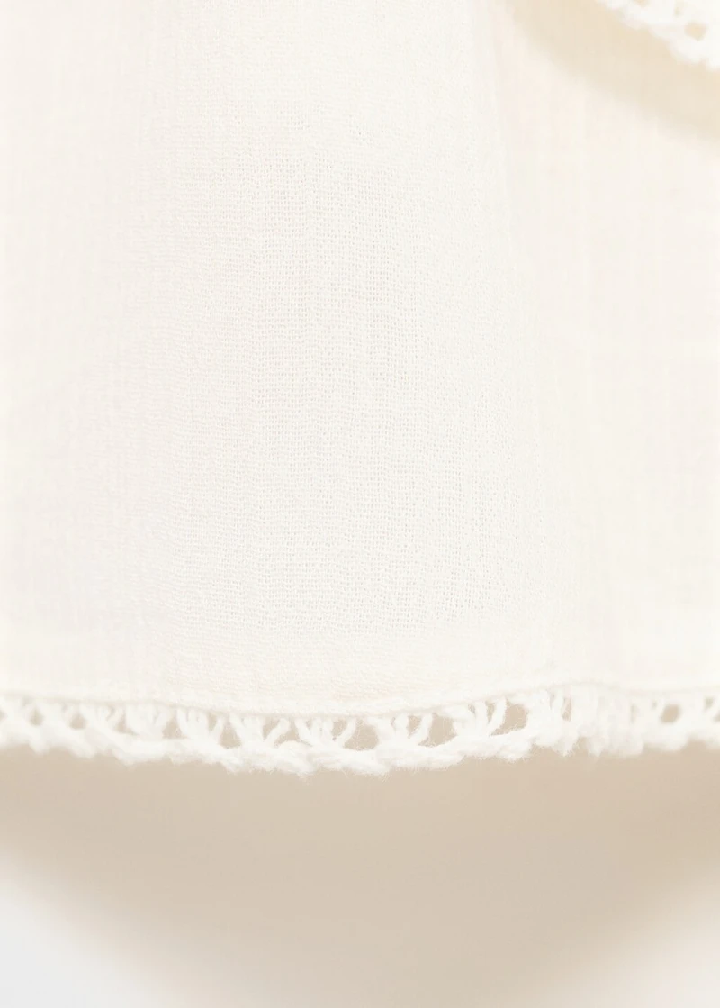 Ruffle top with lace detail