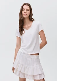 T-shirt with mother-of-pearl button detail