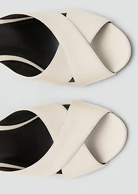 Leather heeled sandal with crossed straps