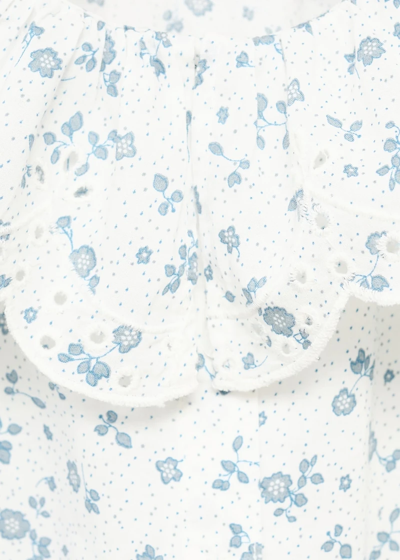 Embroidered babydoll-collar blouse