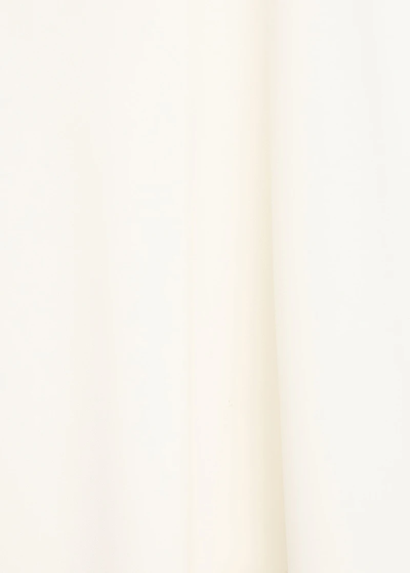 High-neck blouse with asymmetrical sleeves