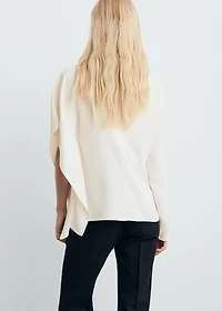 High-neck blouse with asymmetrical sleeves