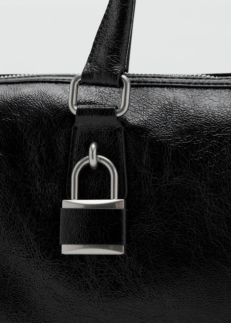 Shiny handbag with handles