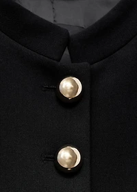 Jacket with jewel-button strip collar