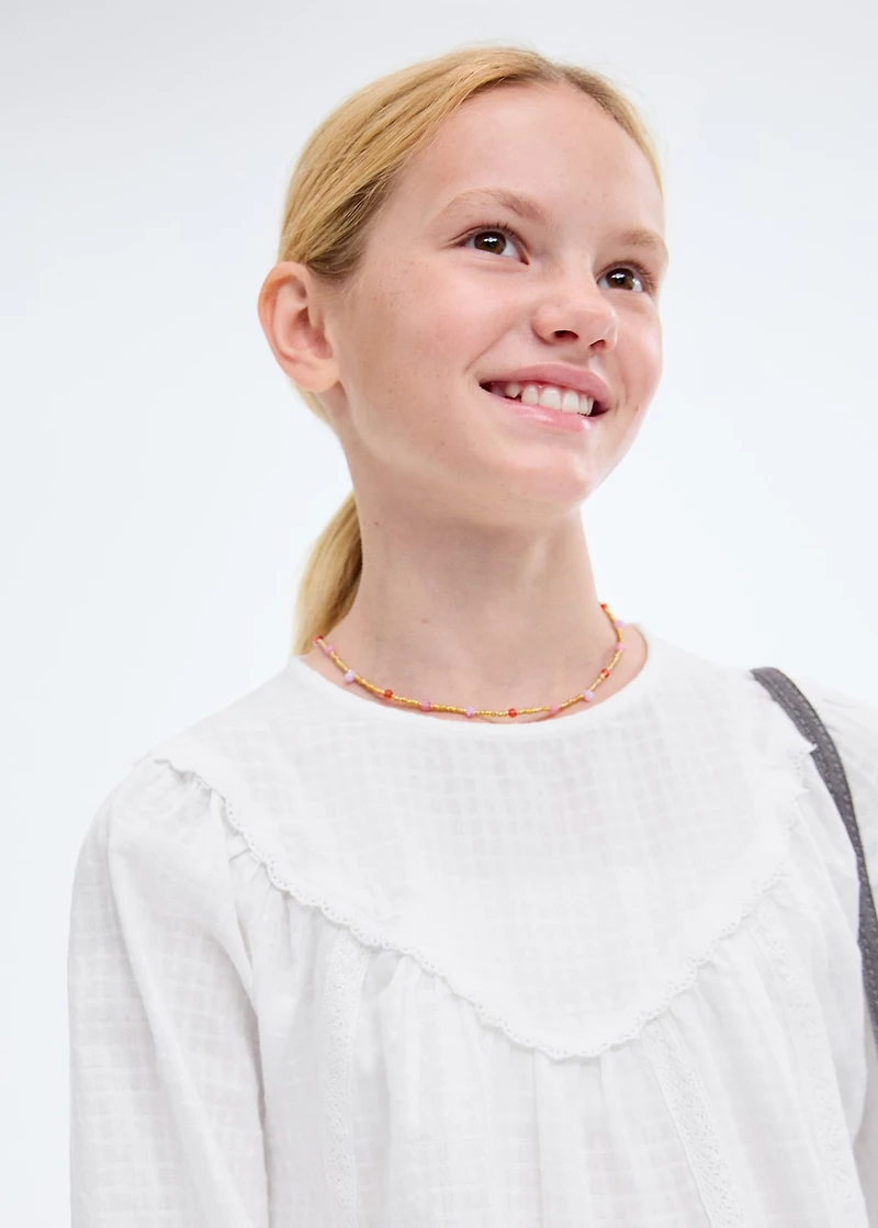 Blouse with lace trim details