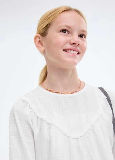 Blouse with lace trim details