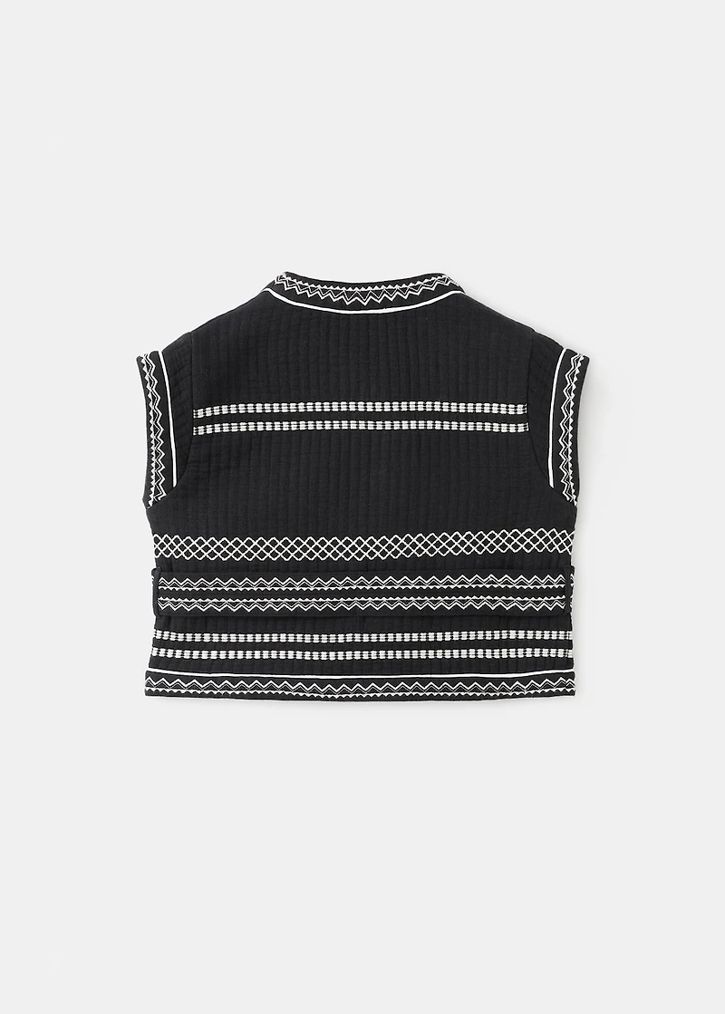 Embroidered vest with belt