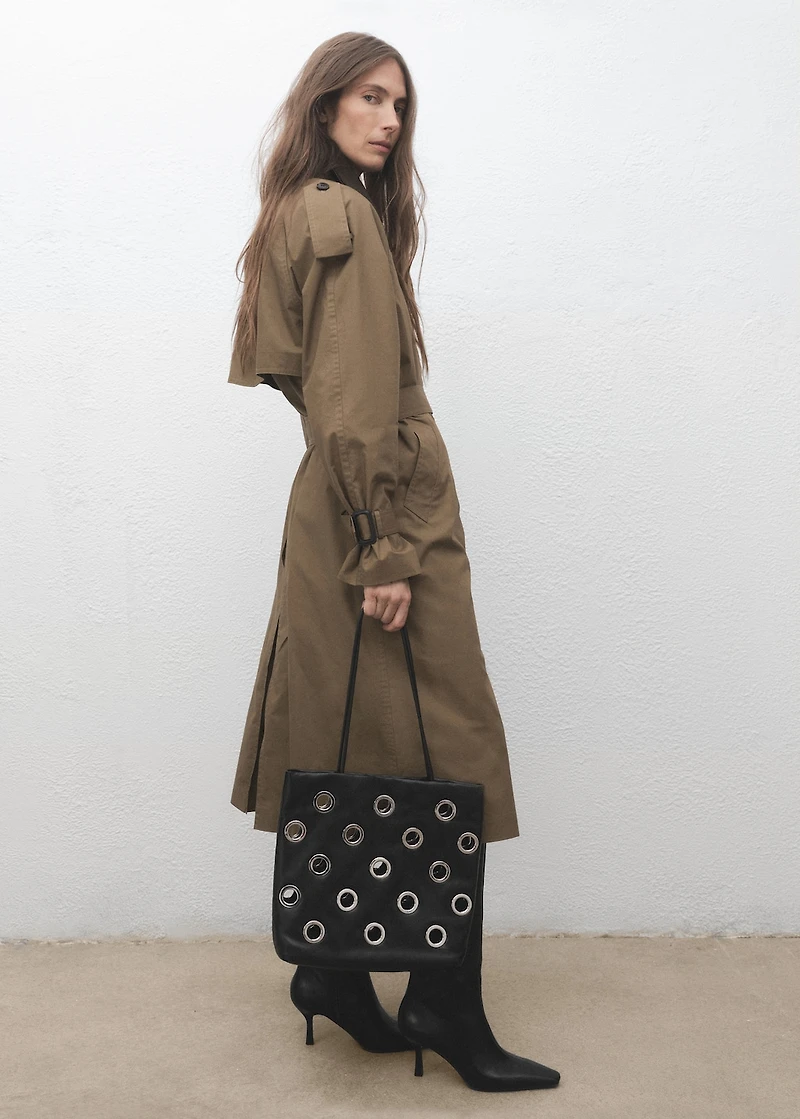 Shoulder bag with eyelets