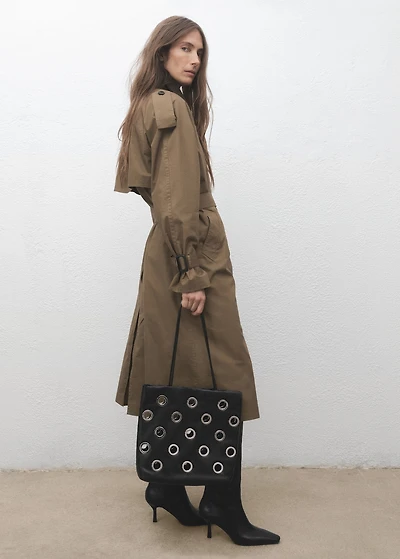 Shoulder bag with eyelets