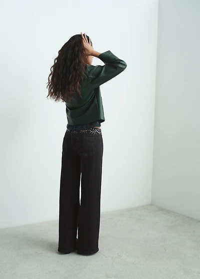 Low-waist studded jeans