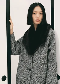 Mottled coat with fur collar