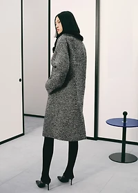 Mottled coat with fur collar