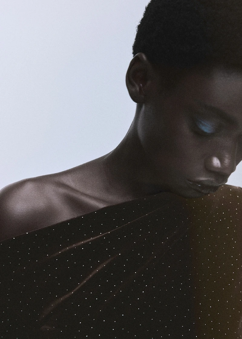 Asymmetrical velvet dress with shiny details