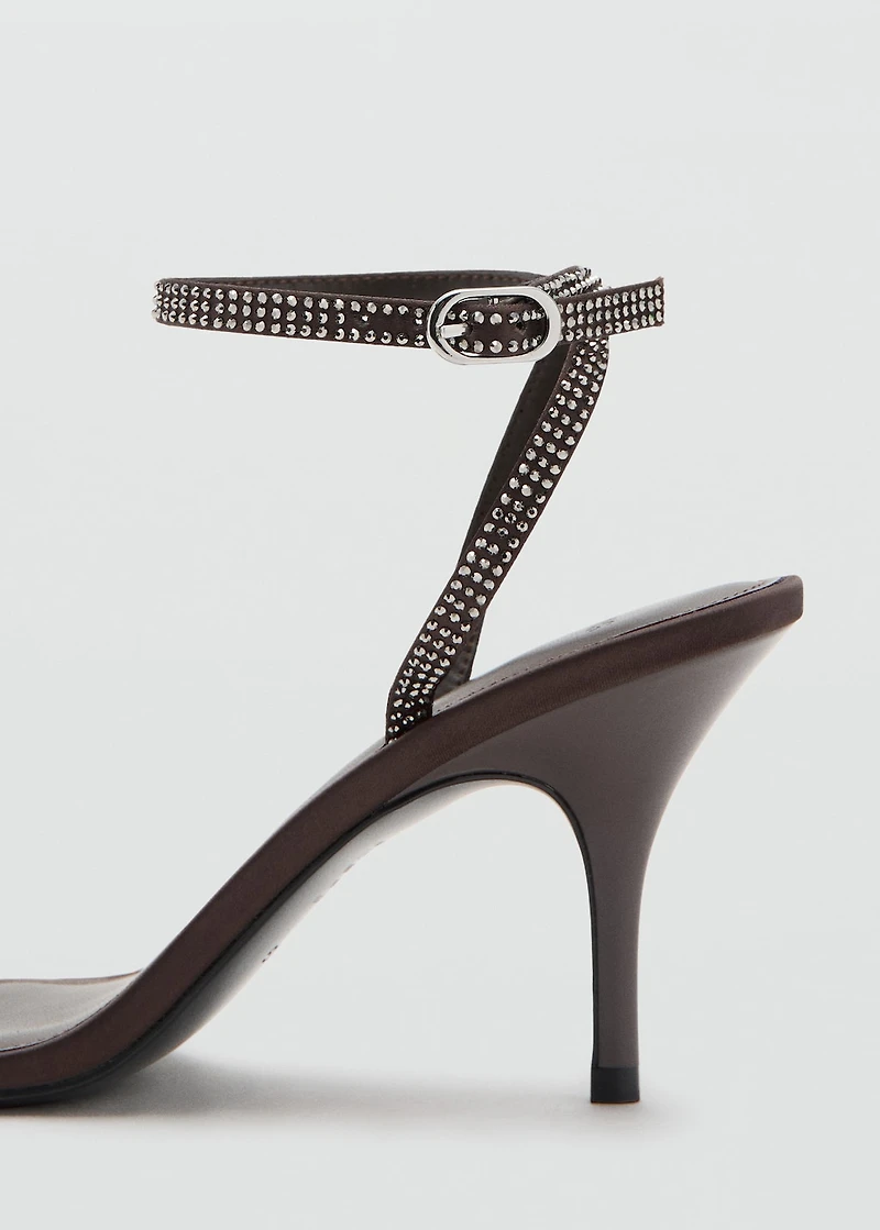 Heeled sandal with strass strap