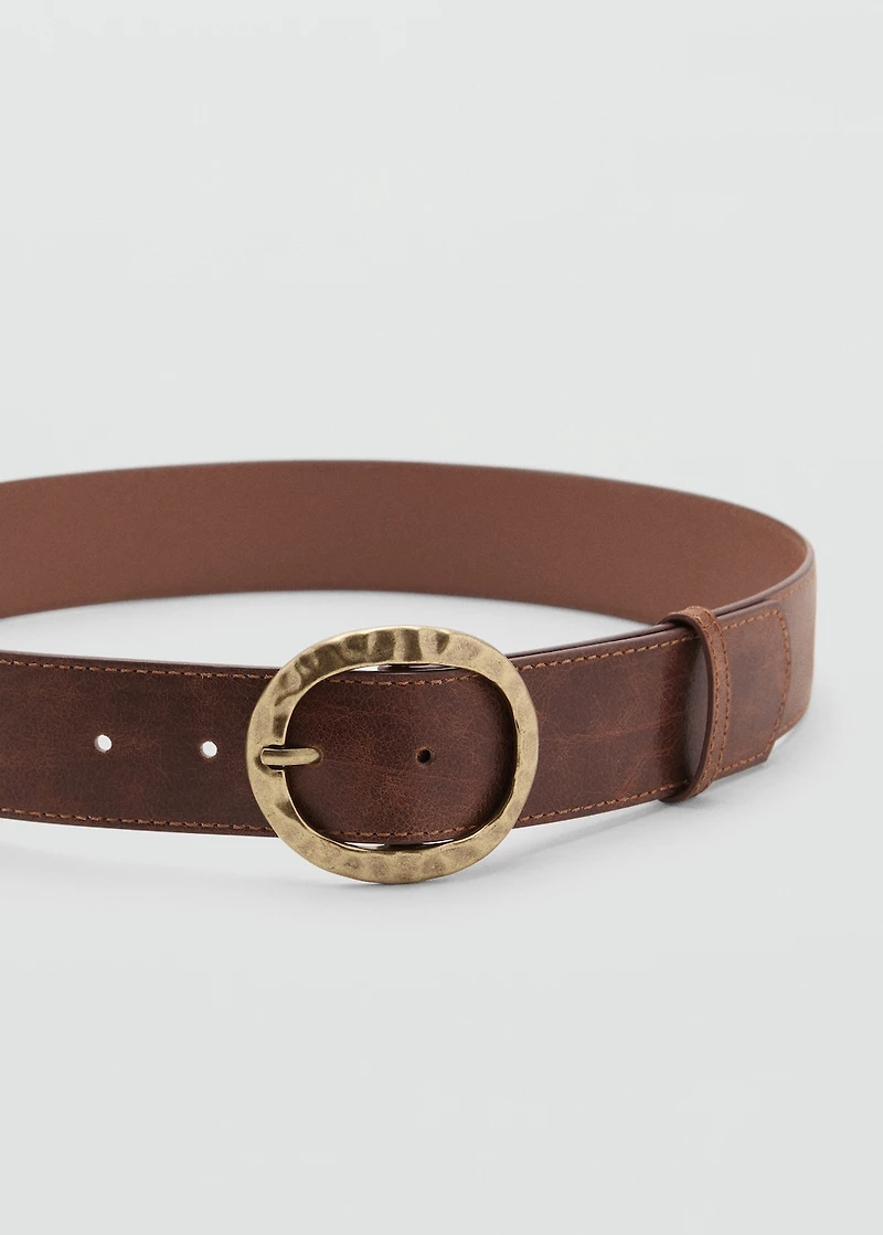 Textured belt with round buckle