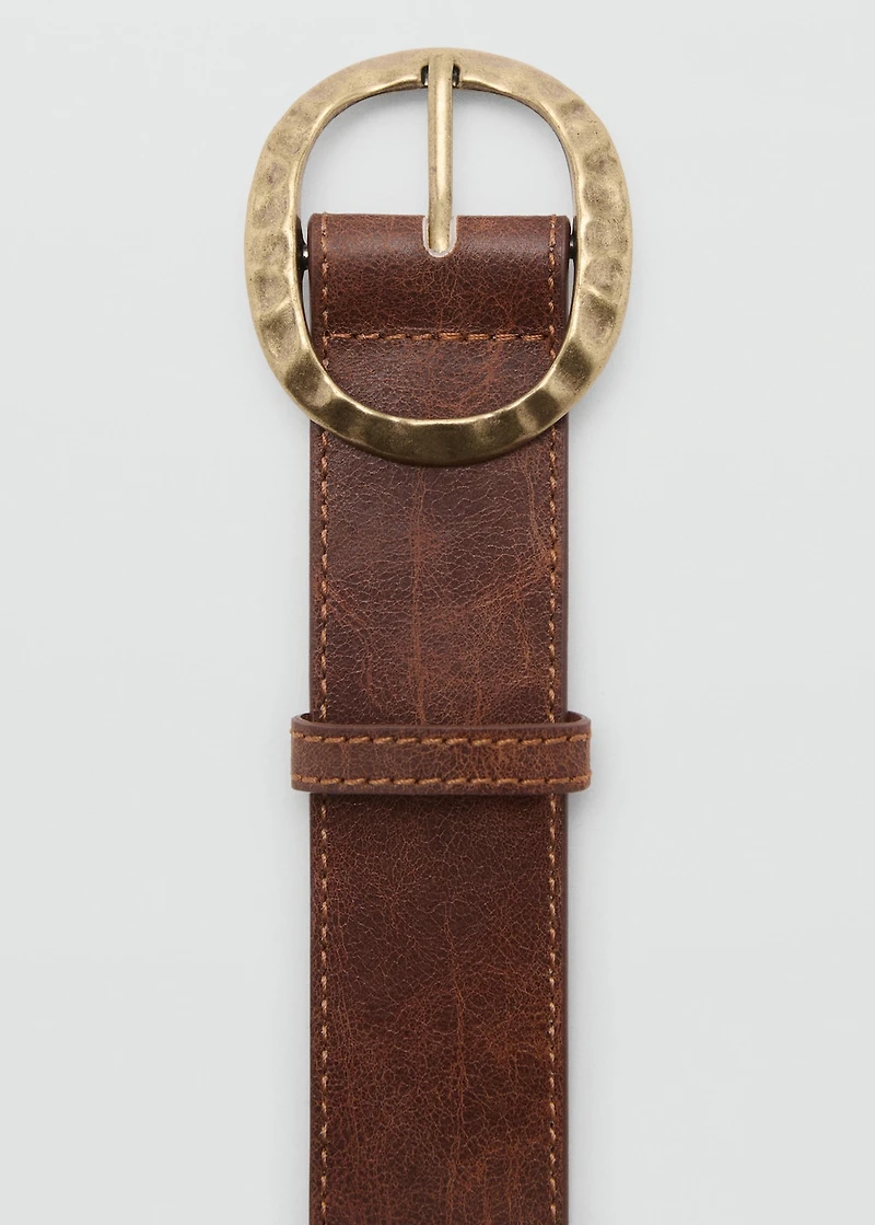 Textured belt with round buckle