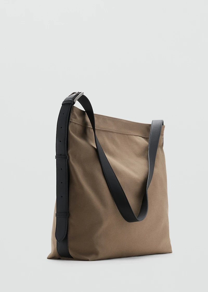 Shopper bag with adjustable handle