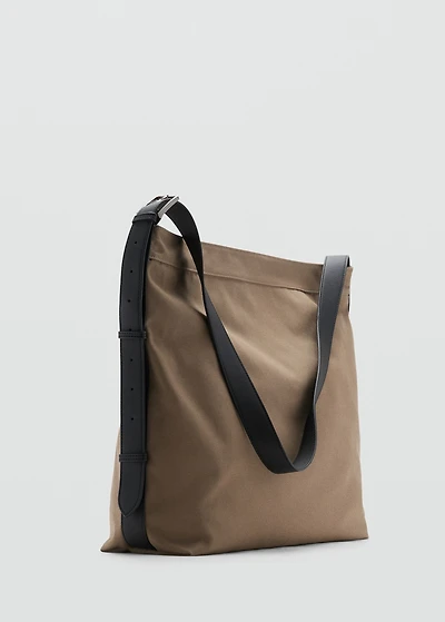 Shopper bag with adjustable handle