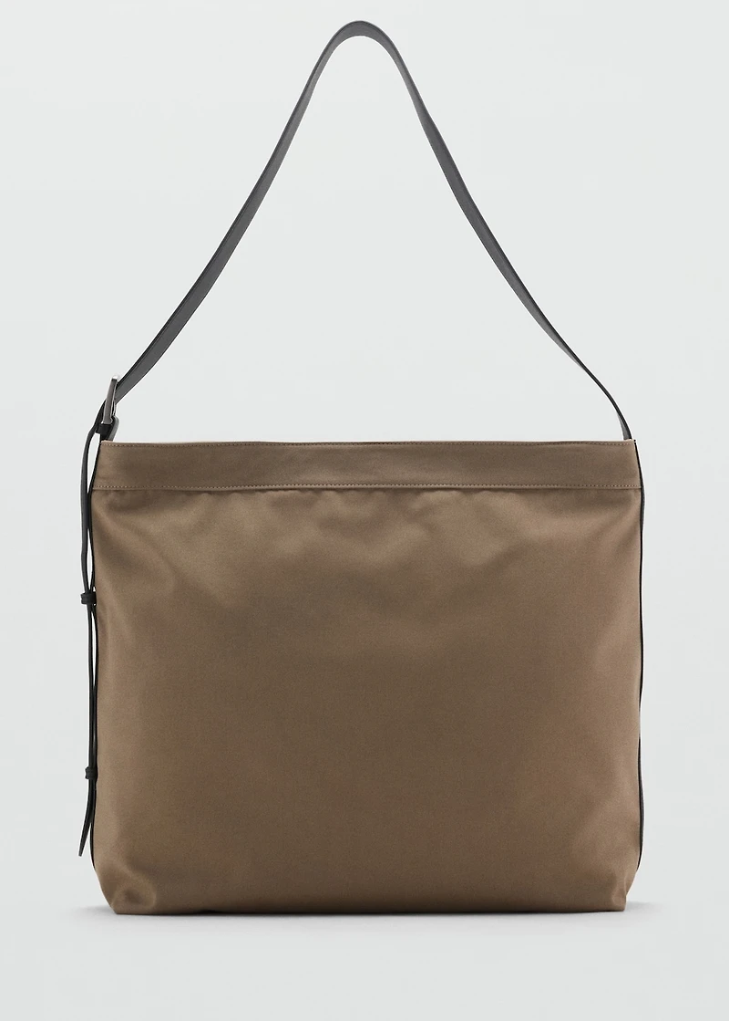 Shopper bag with adjustable handle