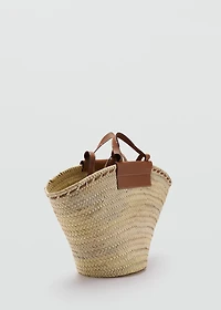 Large natural fiber basket with leather handle