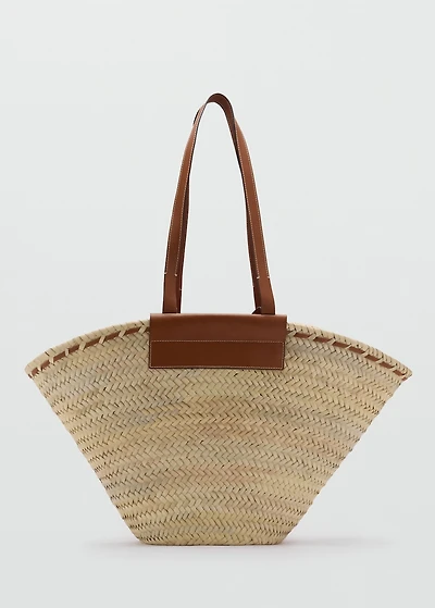 Large natural fiber basket with leather handle