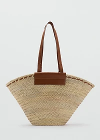 Large natural fiber basket with leather handle