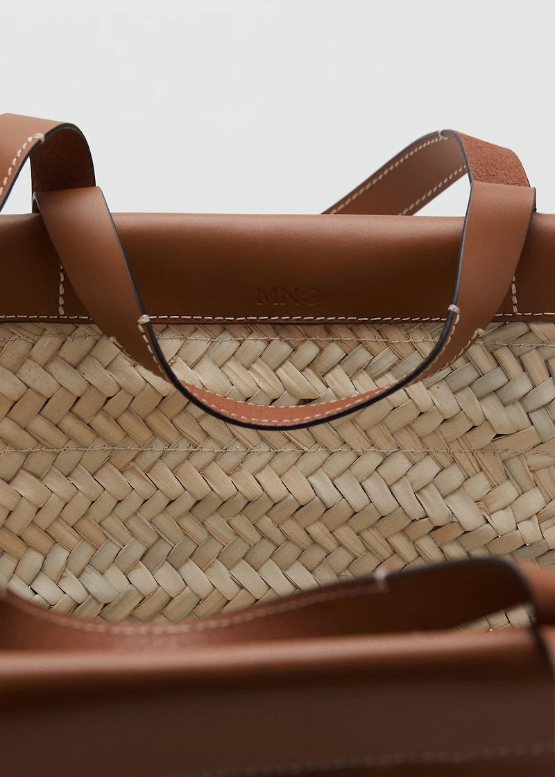Large natural fiber basket with leather handle