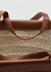 Large natural fiber basket with leather handle