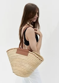 Large natural fiber basket with leather handle