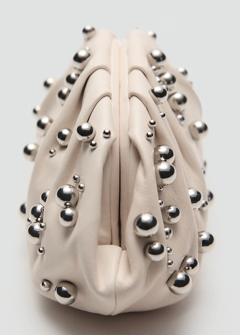 Leather handbag with ball detail