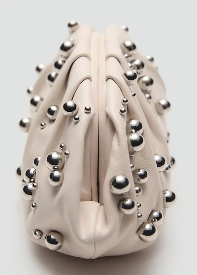 Leather handbag with ball detail