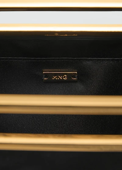 Handbag with metal handle