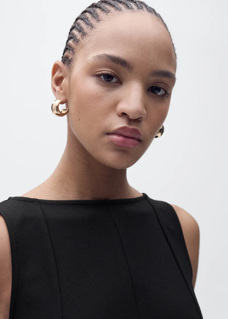 Peplum top with seam detail